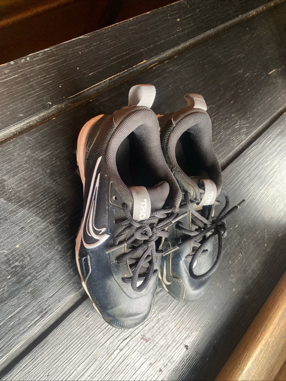 Nike Kids Black Sneakers with White Swoosh football soccer baseball cleats
